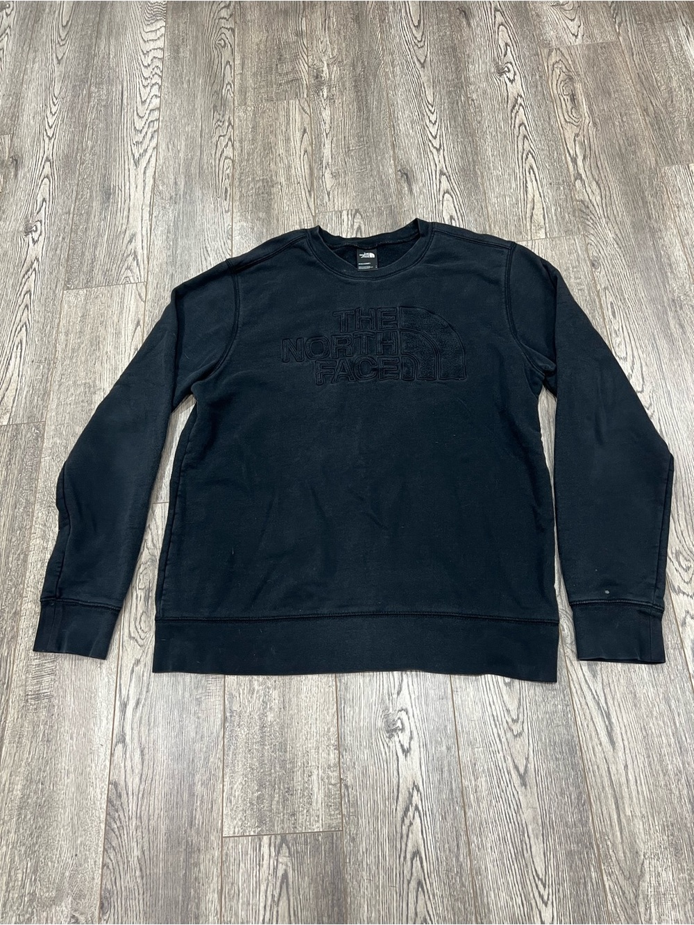 The North Face Black Embossed Logo Crewneck Sweatshirt